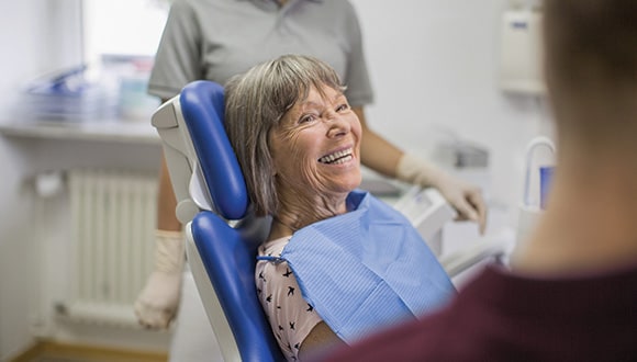 Lady getting a dental check up at the local dentist